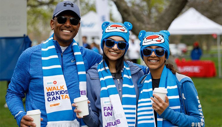 A family participating in BMO Walk so Kids Can Talk