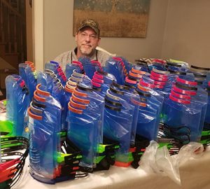 BMO's Tom Rueckl with his homemade 3D printed masks
