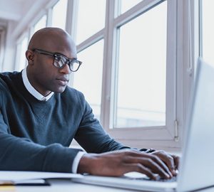 A man working on his laptop