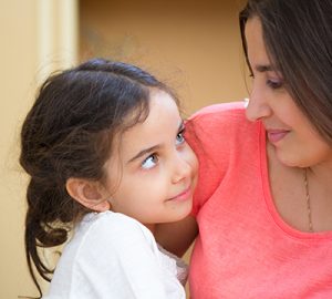Mother and daughter looking at each other