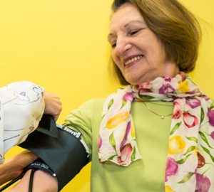 A woman getting her blood pressure taken