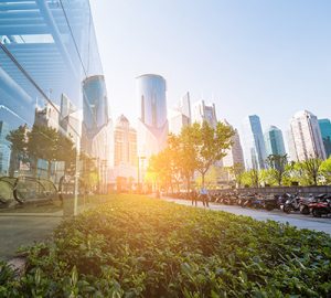 Green space with cityscape in the background